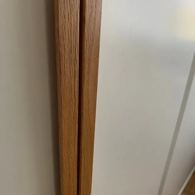 White Cabinets with L-Shaped Handles